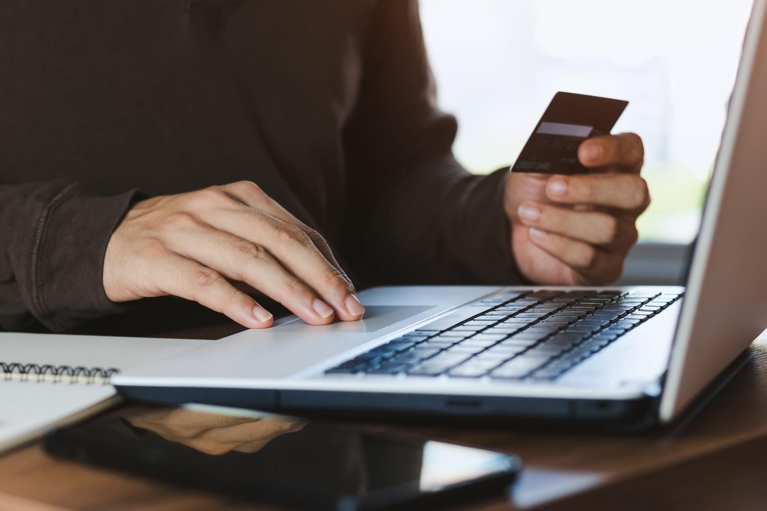 A Man Paying Online Using His Credit Card