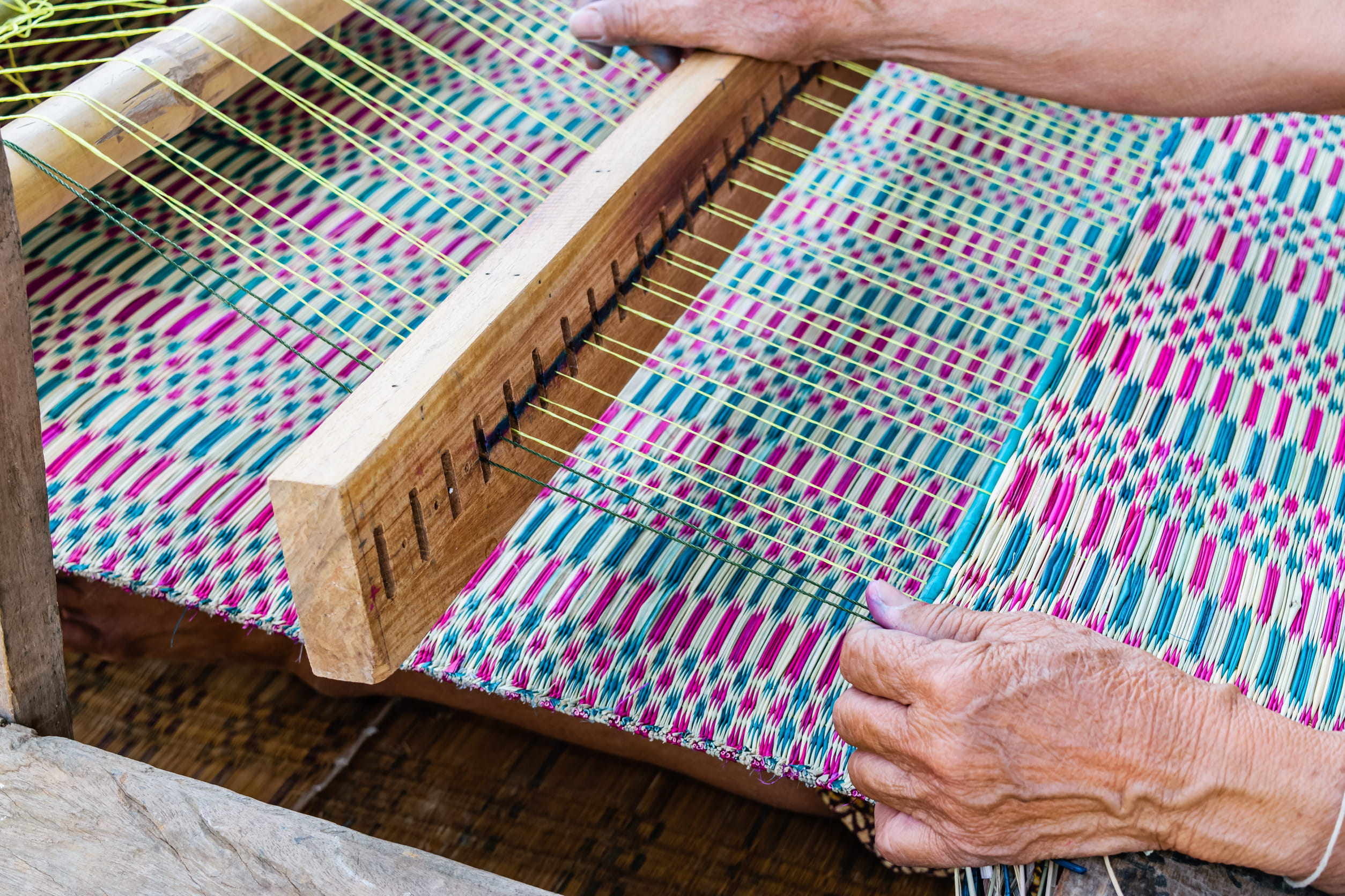 Handwoven Faso Dan Fani textile displayed in vibrant traditional patterns