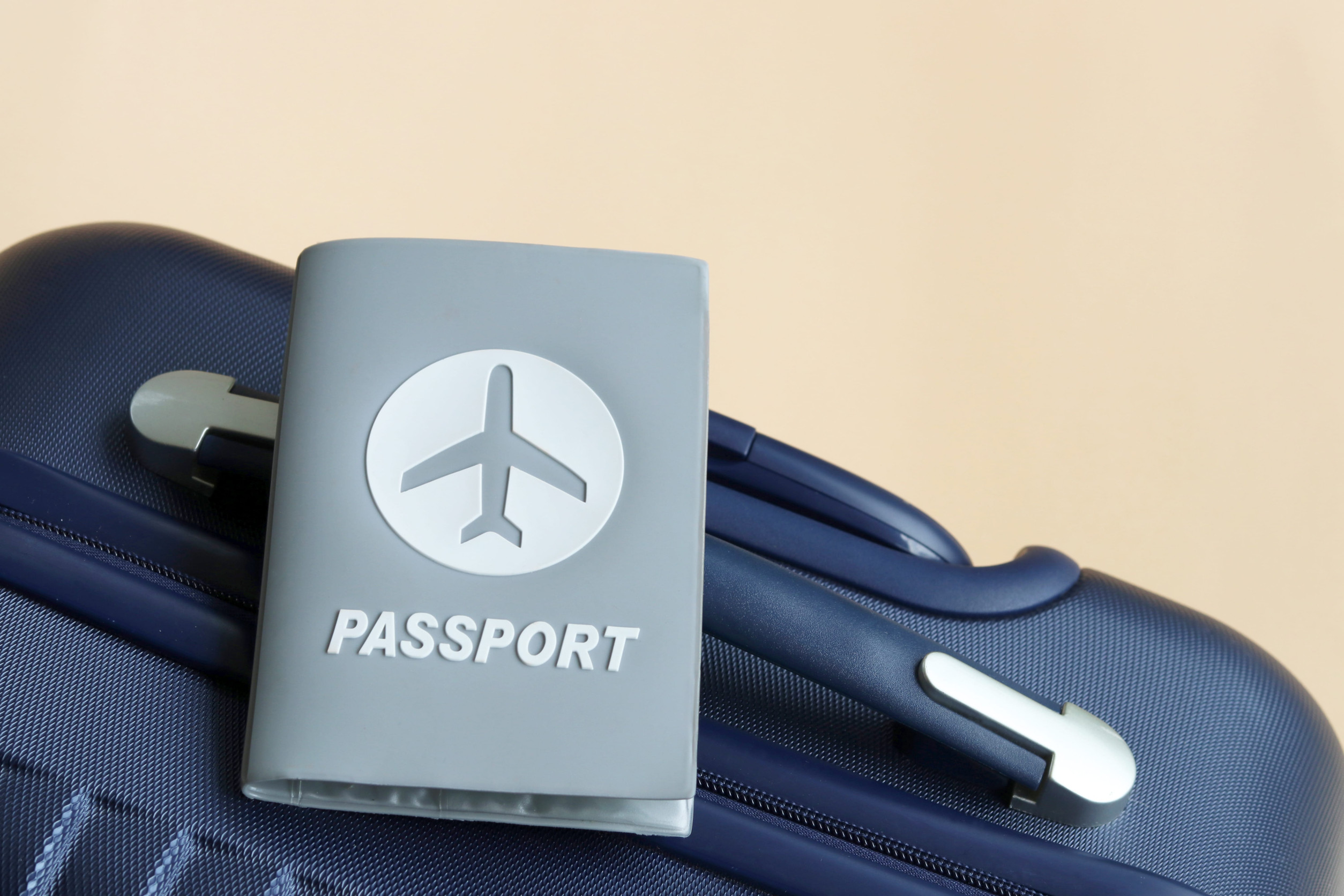 Passport on suitcase with copy space