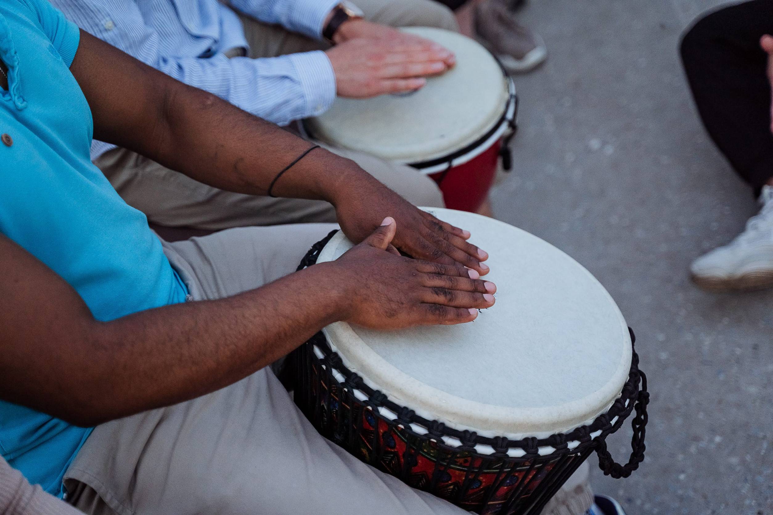 Traditional Musicians Performing Using The Djembe Drum